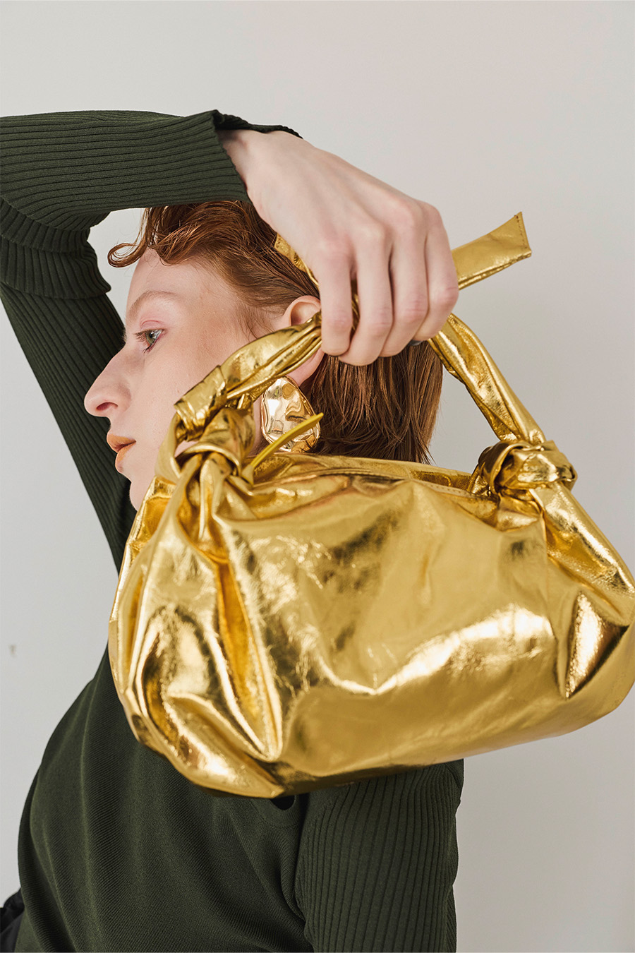 METALLIC KNOT LEATHER BAG